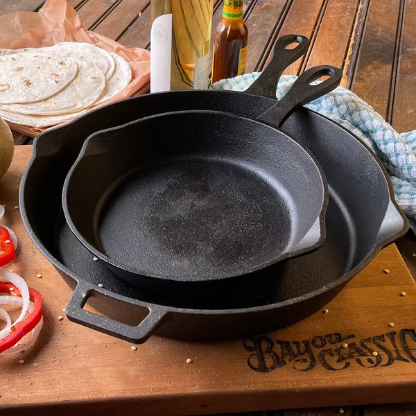 Bayou Classic 14-in Cast Iron Skillet with Pour Spouts and Helper Handle,  Black in the Cooking Pans & Skillets department at